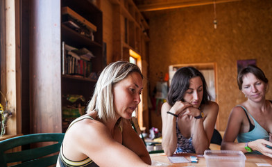 Girlfriends play board games.