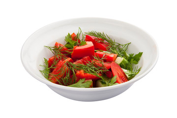 Breakfast. Vegetable salad with tomato and cucumber. On a white background