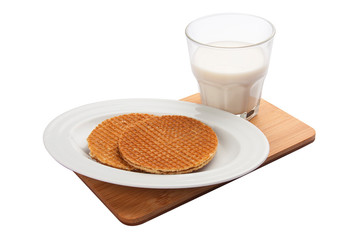 Breakfast. Belgian waffles with milk. On a white background
