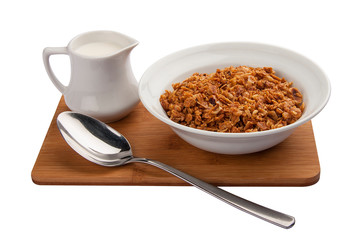 Breakfast. Flakes with milk. On a white background