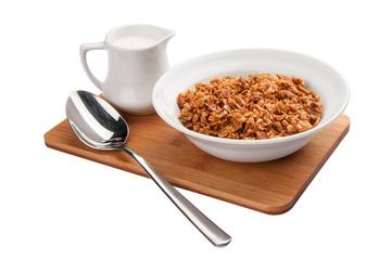 Breakfast. Flakes with milk. On a white background