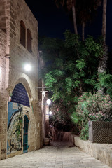 Queet street - Mazal Tal'e at night in old  city Yafo, Israel.