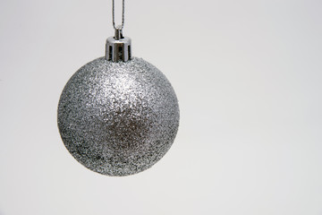 Christmas ball silver color on white background