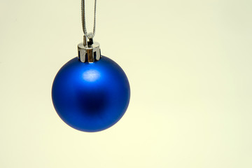 Christmas ball in blue on a white background