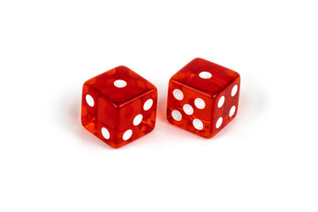 Two red glass dice isolated on white background. One and one