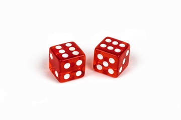 Two red glass dice isolated on white background. Six and six