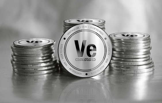 Veritaseum (VERI) digital crypto currency. Stack of silver coins. Cyber money.