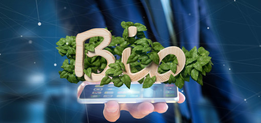 Businessman holding Wooden logo bio with leaves around 3d rendering