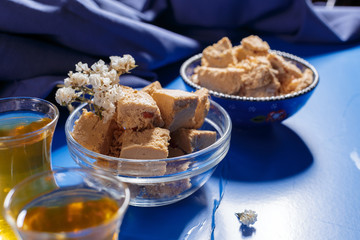 Tasty halva with tea on the table
