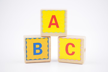 Toy block abc is on a white background. 