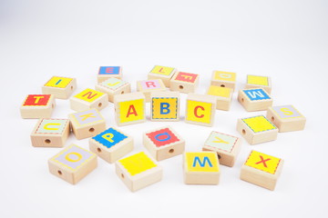 Toy block abc is on a white background. 