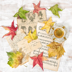 Used paper music notes coffee Autumn background flat lay