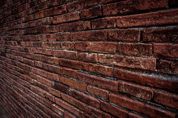 Brown brick wall texture grunge background with vignetted corners, may use to interior design