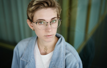 Portrait of beautiful young woman wearing glasses.