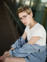 Portrait of beautiful young woman wearing glasses.