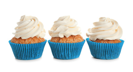Delicious cupcakes on white background