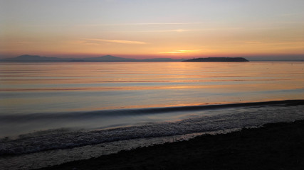 Umbria, italy, a glimpse of Trasimeno lake at sunset with Isola Maggiore on background