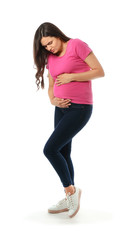 Beautiful pregnant woman on white background