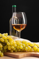 wine and grapes on the table