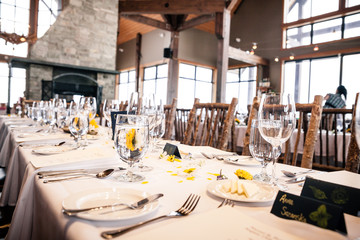 table with plates and cutlery on table in restaurant