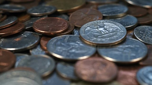 Close up on a pile of American coins US money. Account finance bank business concept
