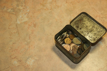 Old soviet union coins collection numismatic in shabby green tea box on marble background