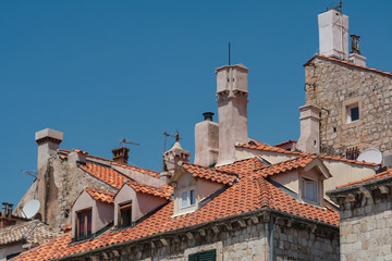 tiled roofs and chimneys of the old city of Dubrovnik in Croatia