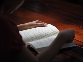 Read book on the table