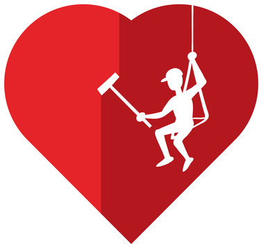 Red heart cleaning by an expert in removing dirtiness and getting brightness back. The cleaner's hanging from the top of the heart while holding and sliding his squeegee and cleaning in a vertical way
