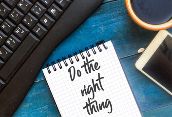     do the right thing on notebook on blue table 