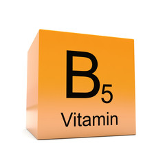 B5 vitamin symbol on yellow orange glossy cube on white background