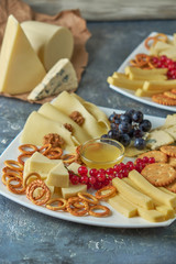 cheese platter on a plate with berries
