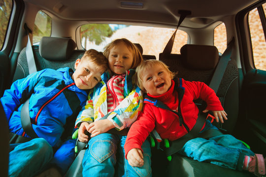 happy kids travel by car, family adventure, vacation concept