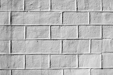 Black and white photo of brick wall in loft style as abstract black and white background