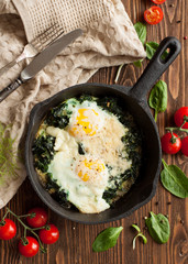 Fried eggs with spinach