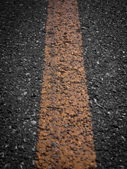 Fototapeta premium Asphalt road with separation yellow lines