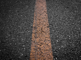 Obraz premium Asphalt road with separation yellow lines