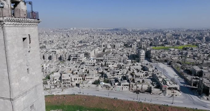 Aerial view of Aleppo cityscape against sky