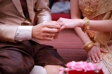 wedding ring on human hand (Thai culture)