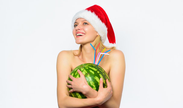 Winter detox concept. How to detox after christmas. How to give your body basic detox. Watermelon dietary detox beverage. Girl attractive naked wear santa hat hug watermelon white background