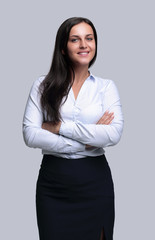 portrait of a smiling young business woman.photo in full growth.