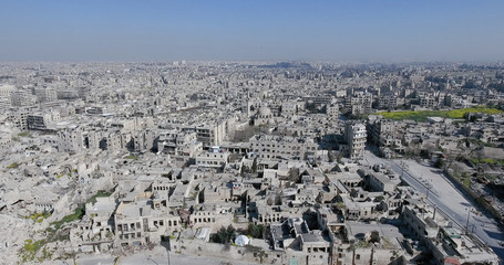  city of Aleppo in aerial view, filmed by a drone, syria - 229903889