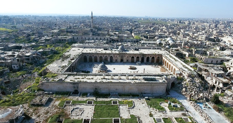 destroyed mosque of Aleppo in aerial view, filmed by a drone, syria
