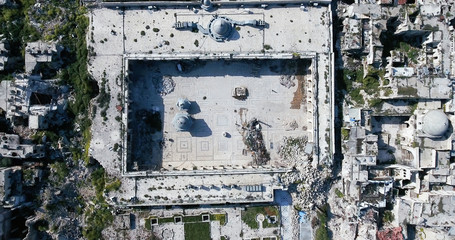 destroyed mosque of Aleppo in aerial view, filmed by a drone, syria