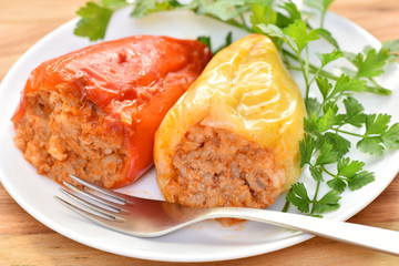Stuffed pepper with meat, rice and carrots. Healthy food. Restaurant dish.