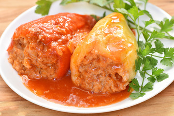 Stuffed pepper with meat, rice and carrots. Healthy food. Restaurant dish.