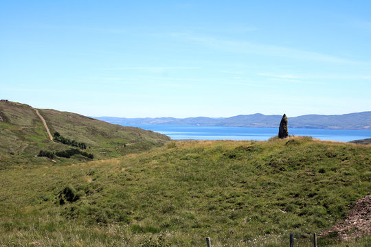 Knocknakilla stone circle situated between Macroom and Millstreet, in County Cork, Ireland. It is set in blanket peatland on the north-west upper slopes of Musherabeg mountain a