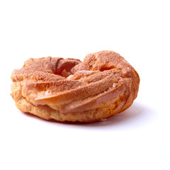 Chocolate and powdered sugar cream puff rings, choux pastry. Isolated on white background.