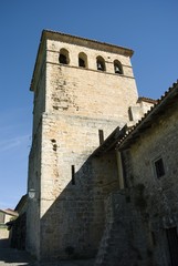 Fototapeta na wymiar Torre de la Colegiata de Santa Juliana en Santillana del Mar en Cantabria