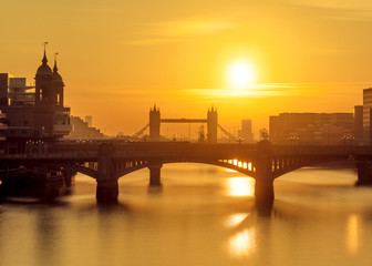 Sunrise behind Tower Bridge, London, UK. Vie taken from the Millenium Bridge - 229909606